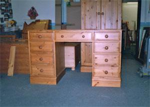 unfinished pine desks, or waxed, lacquered, oiled or painted in a range of materials and colours